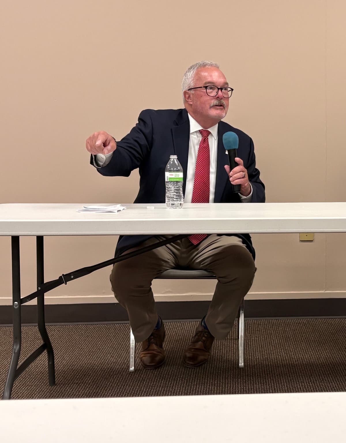 Dave Richardson speaking at a campaign forum